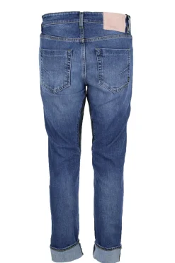 Jeans denim 5 tasche con toppa in alcantara