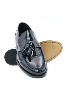 Mocassini in vernice con nappine