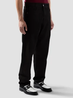 Pantalone jeans 5 tasche in denim trattato