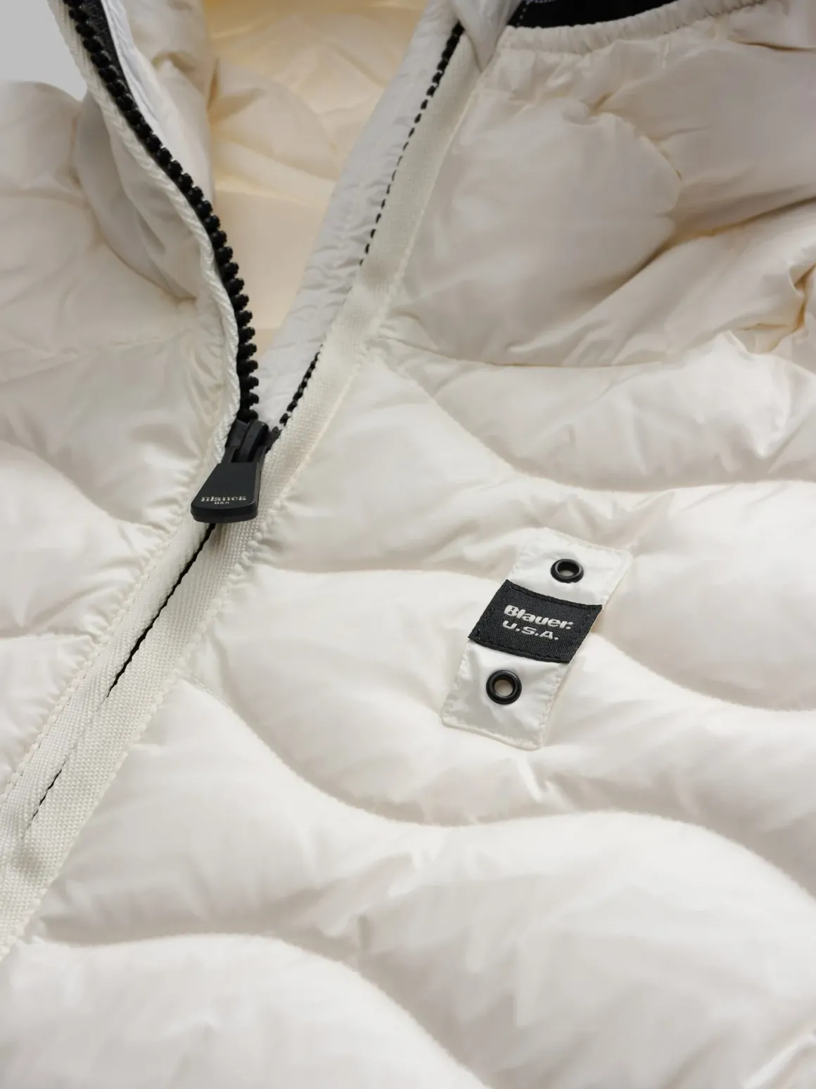 Piumino a onde con cappuccio Camelia