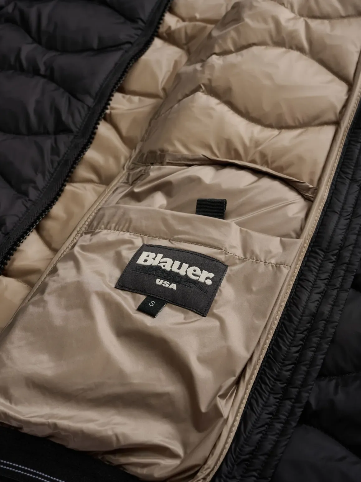 Piumino a onde con cappuccio Camelia